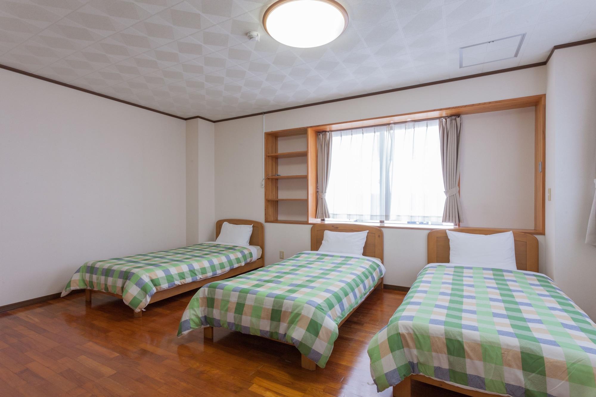 Kariyushi Condominium Resort Sea Side House Nago Bagian luar foto