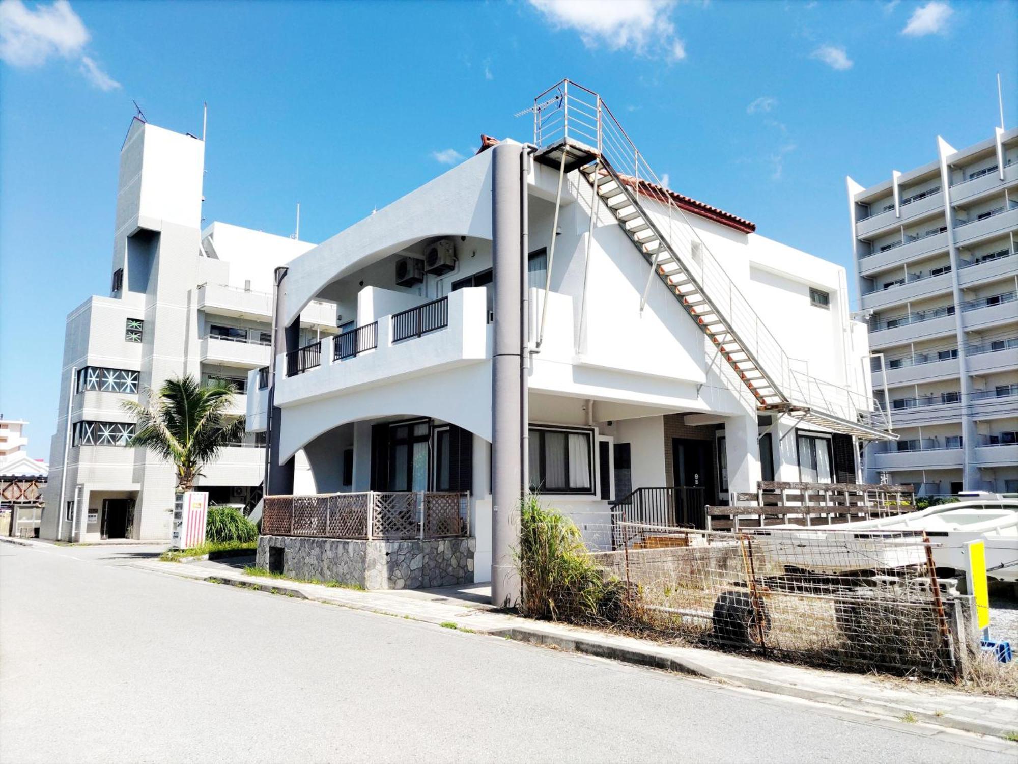 Kariyushi Condominium Resort Sea Side House Nago Bagian luar foto