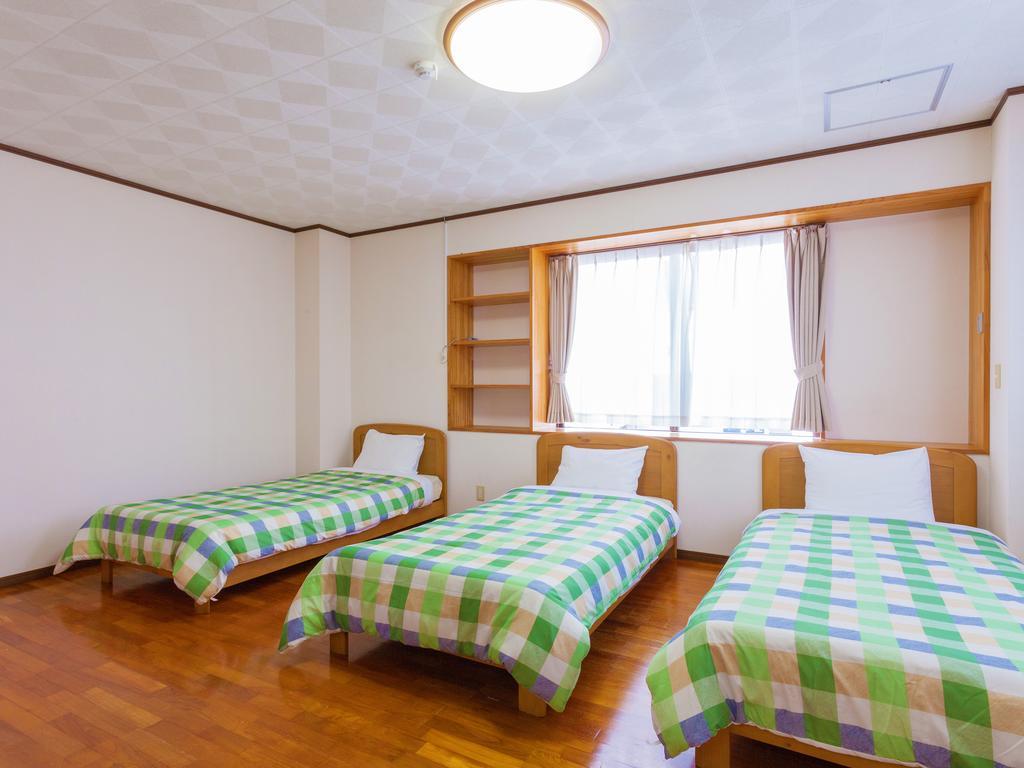 Kariyushi Condominium Resort Sea Side House Nago Bagian luar foto