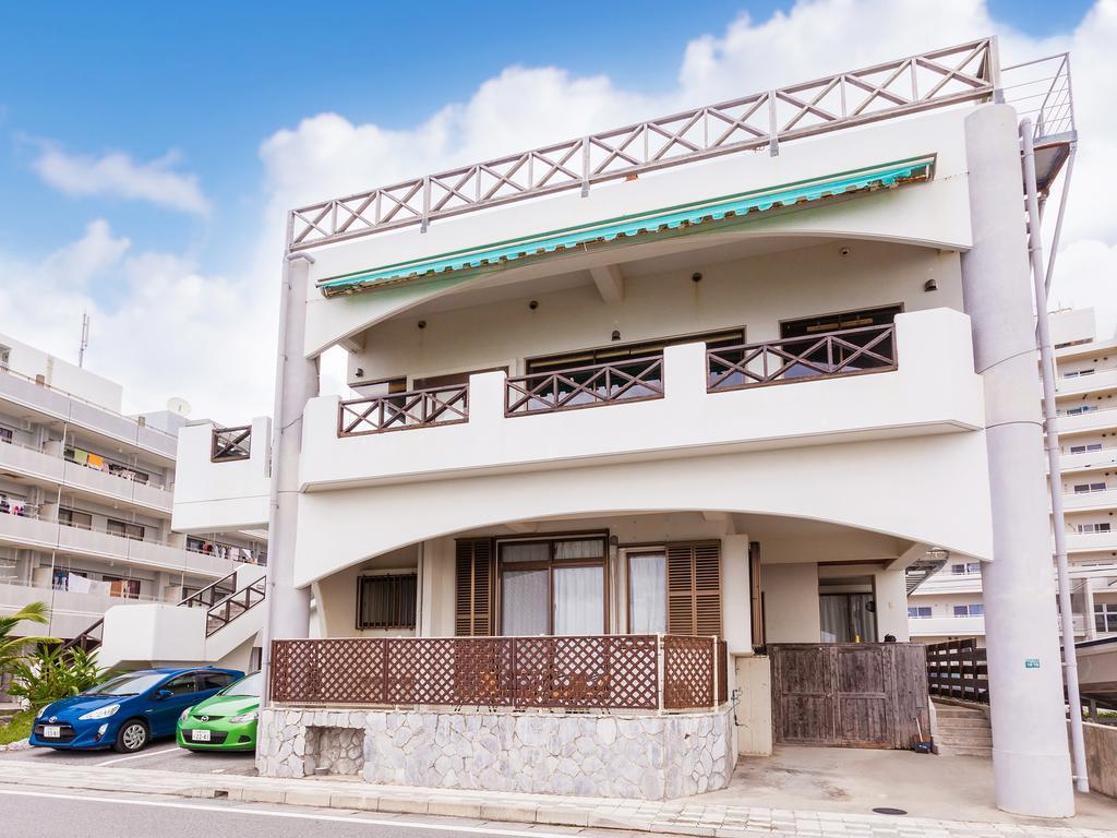 Kariyushi Condominium Resort Sea Side House Nago Bagian luar foto